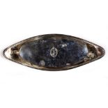 A GEORGE III SILVER OVAL SNUFFER TRAY with reeded edge, central crest and with marks for John Emes