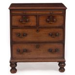 A GEORGE III MAHOGANY CHEST OF TWO SHORT AND TWO LONG DRAWERS with brass swan neck handles and later