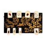 A LATE 19TH CENTURY JAPANESE LACQUERED SHIBAYAMA AND IVORY WHIST COUNTER decorated with insects, 9cm