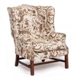 A GEORGE III STYLE WING BACK ARMCHAIR 90cm wide x 96cm deep x 112cm high approximately Condition: