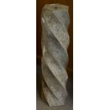 A SPIRALLING GRANITE COLUMN