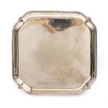 A GEORGE VI SQUARE SALVER with canted corners and short feet, marks for Deakin (Silversmiths) Ltd