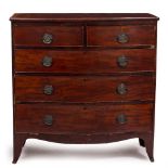 A MID 19TH CENTURY BOW FRONTED MAHOGANY CHEST OF TWO SHORT AND THREE LONG DRAWERS standing on