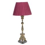 A CAST BRASS TABLE LAMP in the form of a torchiere on tripod base, with paw feet and triangular
