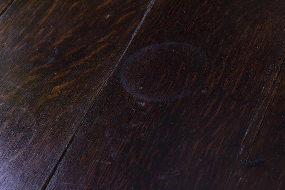 A 19TH CENTURY OAK DRESSER BASE with two panelled doors and three central drawers, on bracket - Image 6 of 7