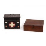 A BLACK PAINTED FIRST AID BOX with lifting lid, fall front and fitted interior, 35cm wide together