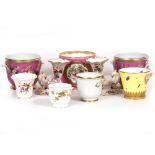 THREE 19TH CENTURY PINK GROUND PORCELAIN JARDINIERES each with gilded and hand painted floral