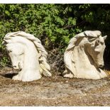 TWO HORSES HEAD SCULPTURES with flowing manes, 74cm high x 75cm deep each Condition: casting marks