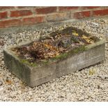 A CAST RECONSTITUTED STONE SHALLOW TROUGH OR PLANTER 66cm wide x 38cm deep x 15cm high together with