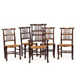 FIVE 19TH CENTURY OAK RUSH SEAT SPINDLE BACK KITCHEN DINING CHAIRS (four standards and one