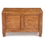 A PINE BLANKET BOX with panelled sides and turned feet, 91cm wide x 48cm deep x 60cm high At