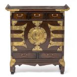 AN ORIENTAL STAINED WOOD TABLE TOP CHEST OF THREE SMALL DRAWERS above two doors and two short