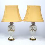 A PAIR OF PARIS PORCELAIN TABLE LAMPS of baluster vase form with gilded decoration and gilt metal