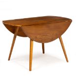 AN ERCOL LIGHT ELM DROP LEAF KITCHEN TABLE with splayed square tapering legs, 113cm wide x 125cm