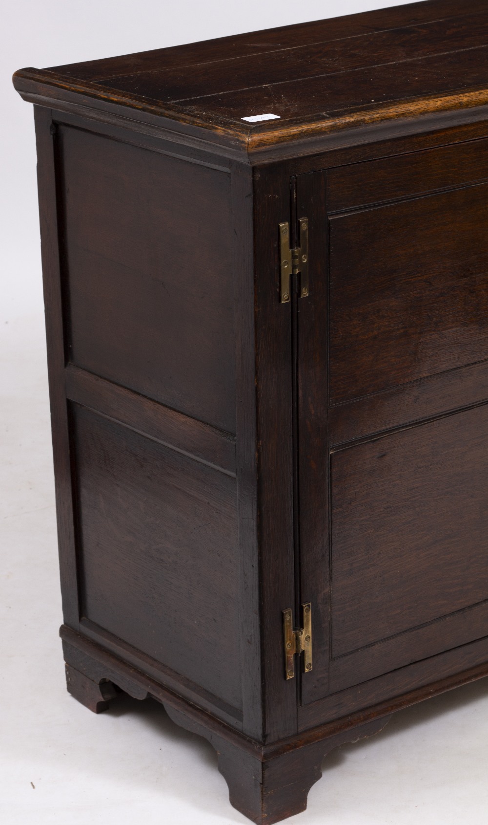 A 19TH CENTURY OAK DRESSER BASE with two panelled doors and three central drawers, on bracket - Image 7 of 7