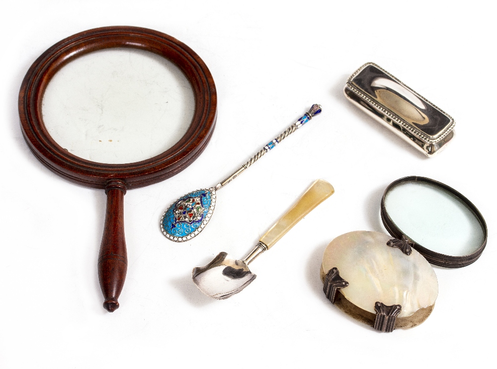 A MAHOGANY MAGNIFYING GLASS with turned handle, 13cm diameter together with a white metal and mother