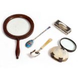 A MAHOGANY MAGNIFYING GLASS with turned handle, 13cm diameter together with a white metal and mother