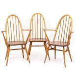 TWO ERCOL LIGHT ELM SPINDLE BACK ARMCHAIRS, a matching chair and two mid to late 20th century