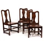 FOUR EARLY 19TH CENTURY OAK CHAIRS with curved central splat, three with square stretchers and