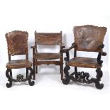 A SET OF THREE ITALIAN POSSIBLY 18TH CENTURY WALNUT CHAIRS with carved scrolling front legs and