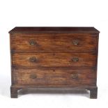 A 19TH CENTURY MAHOGANY CHEST OF THREE LONG DRAWERS with brass handles and bracket feet, 117cm