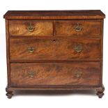 A VICTORIAN MAHOGANY CHEST OF TWO SHORT AND TWO LONG DRAWERS standing on turned feet, 102.5cm wide x
