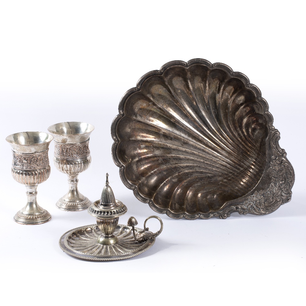 A PAIR OF SILVER PLATED GOBLETS, a scallop design chamber stick and snuff, a large silver plated