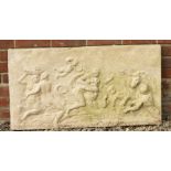 A CAST RECONSTITUTED STONE PLAQUE depicting classical figures wrestling in the sea, 95cm wide x 51cm