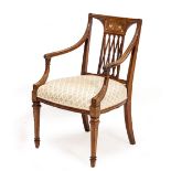 A ROSEWOOD OPEN ARMCHAIR with decorative inlay to the back, overstuffed upholstered seat, carved