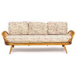AN ERCOL LIGHT ELM THREE SEATER SETTEE OR DAY BED with spindle supports, 204cm wide x 77cm deep x