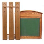 AN OAK NOTICE BOARD with arching top, 99cm wide x 102cm high x 10cm deep together with an oak