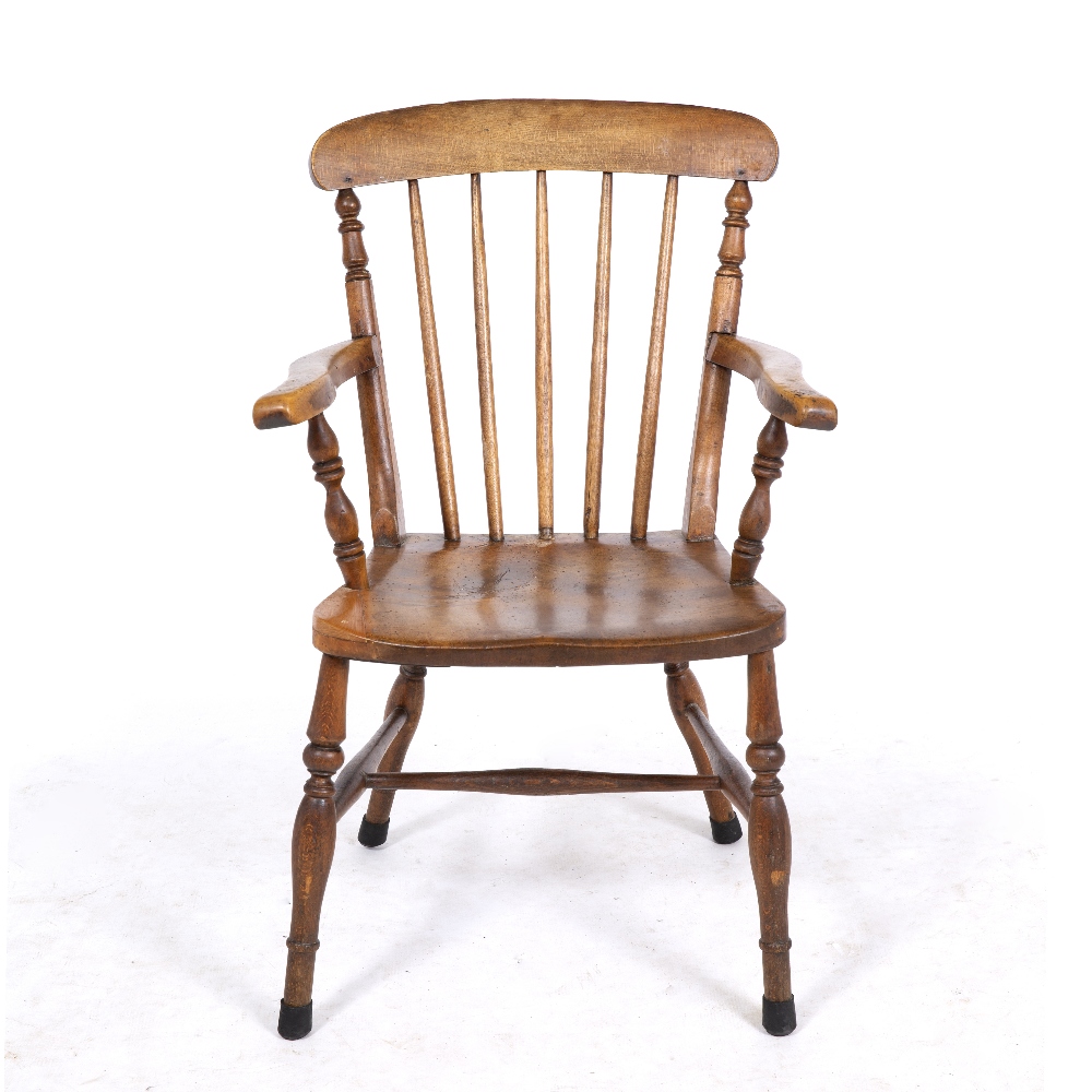 AN OLD WINDSOR CHAIR with comb back, 55cm wide x 88cm high Condition: signs of old woodworm