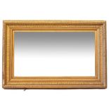 A RECTANGULAR GILT WALL MIRROR with moulded gesso frame and later mirror plate, 96cm wide x 145.