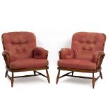 A PAIR OF ERCOL STAINED WOOD UPHOLSTERED SPINDLE BACK ARMCHAIRS each 81cm wide x 84cm deep x 83cm