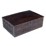 A 17TH / 18TH CENTURY OAK BIBLE BOX with carved flowerhead decoration, 72cm wide x 46cm deep x