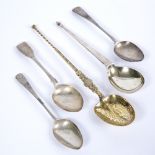A DECORATIVE SILVER GILT SPOON with marks for Birmingham 1936, 25.5cm long together with an arts and
