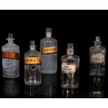 THREE 19TH CENTURY GLASS APOTHECARY BOTTLES