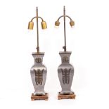 A PAIR OF ORIENTAL STYLE PEWTER TABLE LAMPS in the form of lidded vases on square wooden bases, each