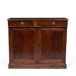 A MAHOGANY SIDE CABINET with two drawers over two cupboard doors and standing on plinth base, 108.