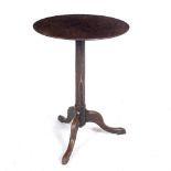 AN ANTIQUE CIRCULAR TRIPOD TABLE with plain column support and carved legs, 48.5cm diameter x 67cm