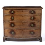 A GEORGE III MAHOGANY BOW FRONTED CHEST OF FOUR LONG DRAWERS with octagonal brass handles and