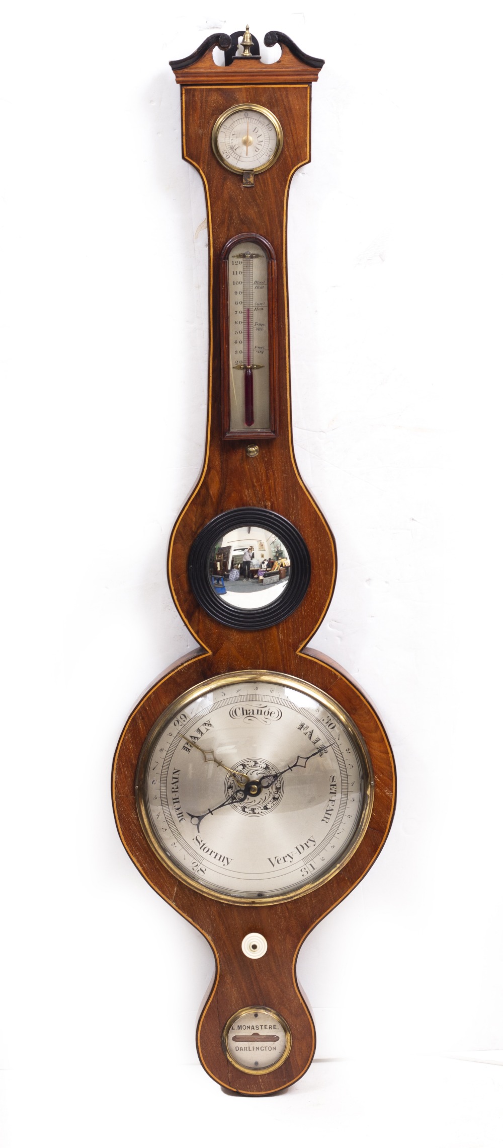 A 19TH CENTURY MAHOGANY WHEEL BAROMETER signed 'L Monastere of Darlington', with silvered dial
