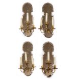 A SET OF FOUR WALL LIGHTS OR SCONCES with engraved mirrored backs and three scrolling branches