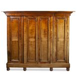A VICTORIAN MAHOGANY FOUR DOOR WARDROBE the central section with twin doors opening to reveal