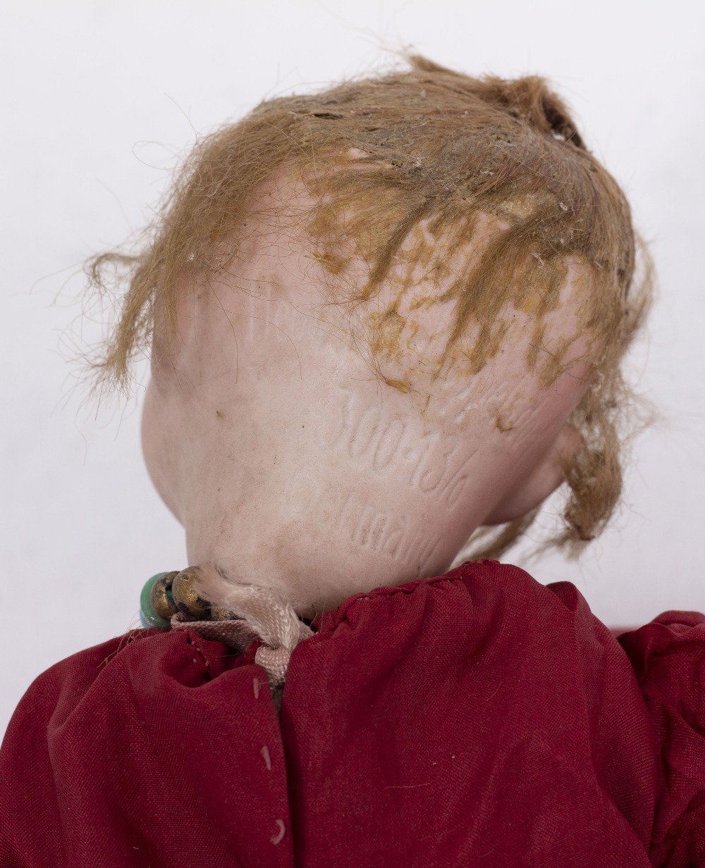 A GERMAN PORCELAIN HEADED DOLL by Heubach Koppelsdorf, stamped to the reverse with the makers name - Image 5 of 5