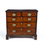 A LATE 18TH CENTURY WALNUT CHEST OF TWO SHORT AND THREE LONG DRAWERS with later brass handles and