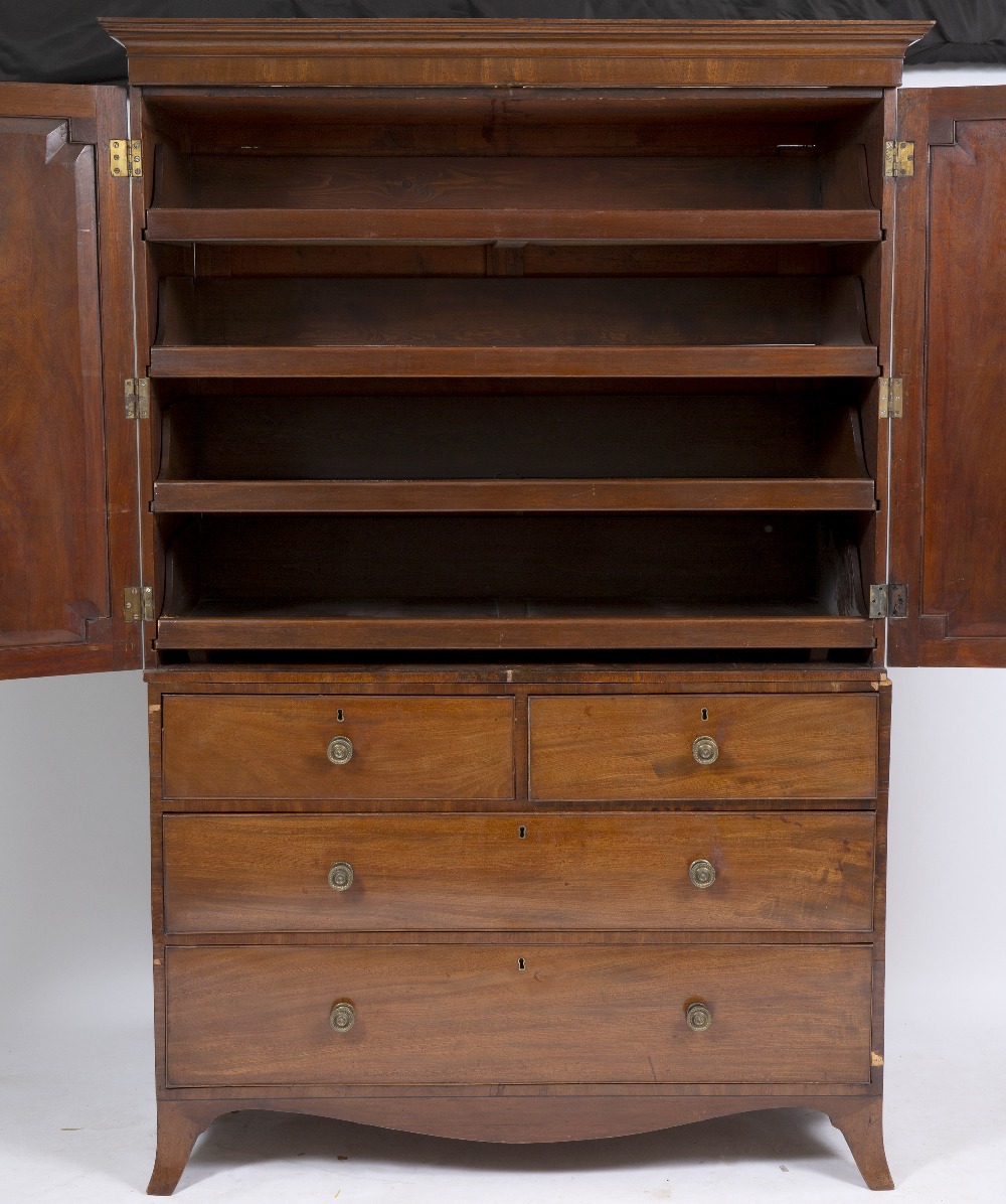 A 19TH CENTURY MAHOGANY LINEN PRESS with twin panelled doors above two short and two long drawers - Image 2 of 10