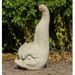 A CAST RECONSTITUTED STONE SCULPTURE of a classical dolphin, 31cm wide x 48cm deep x 88cm high