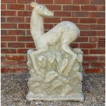 AN ART DECO STYLE RECONSTITUTED STONE SCULPTURE of a deer, 58cm wide x 24cm deep x 94cm high