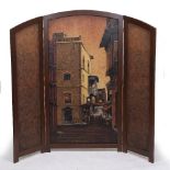 A THREE FOLD HARDWOOD FRAMED SCREEN set with painted panels to the central scene depicting an Arabic
